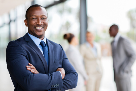 african office worker with arms crossed african office worker with arms crossed